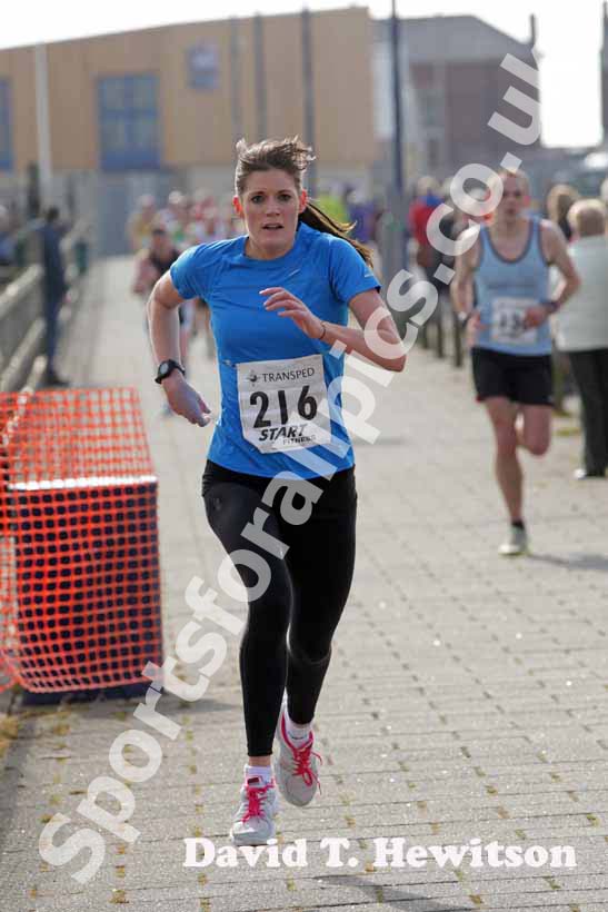 Lucy Wallace finishing the womens Transped Blyth Valley 10k.